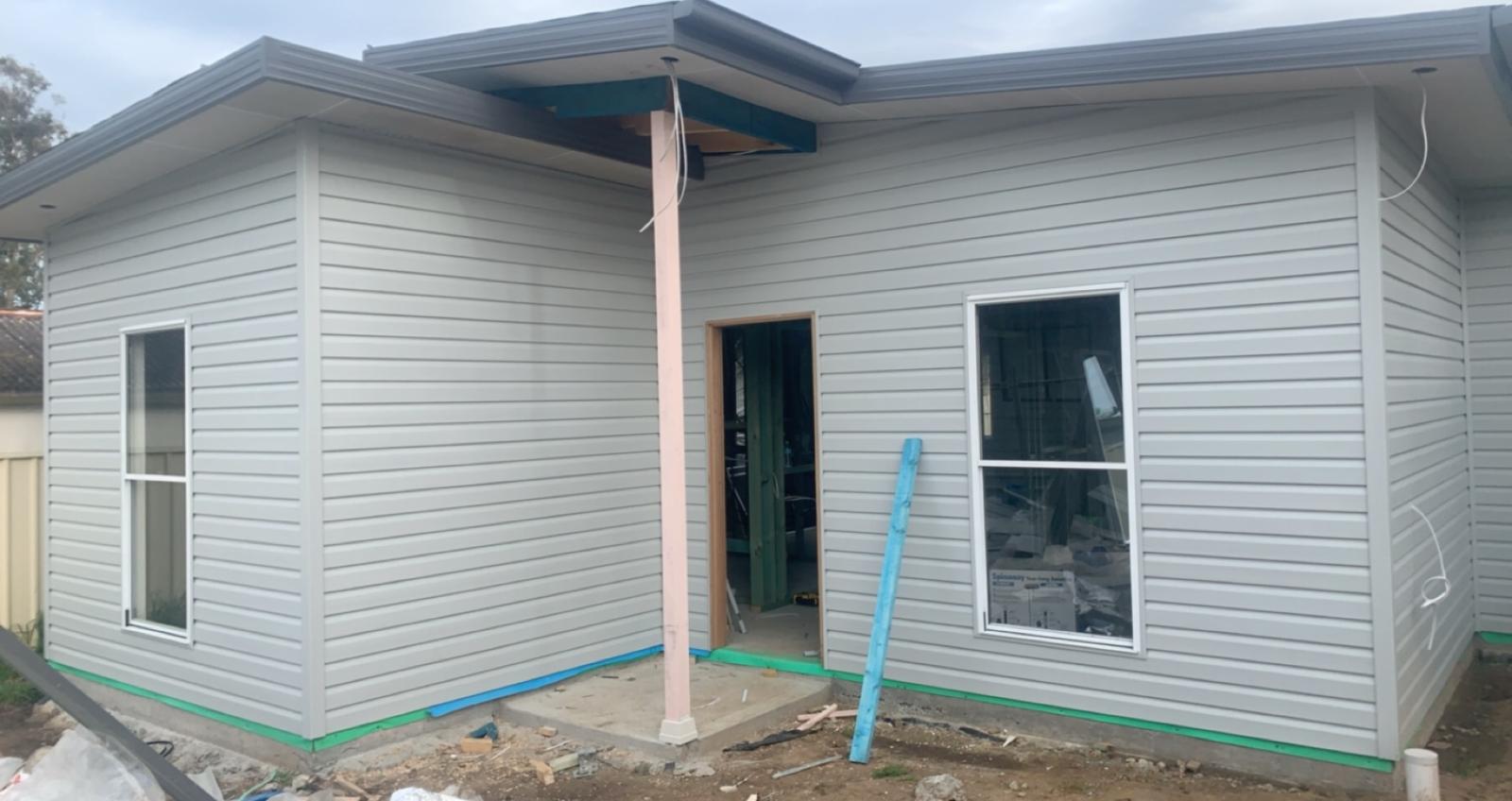 Weatherboard corner wrap and eaves