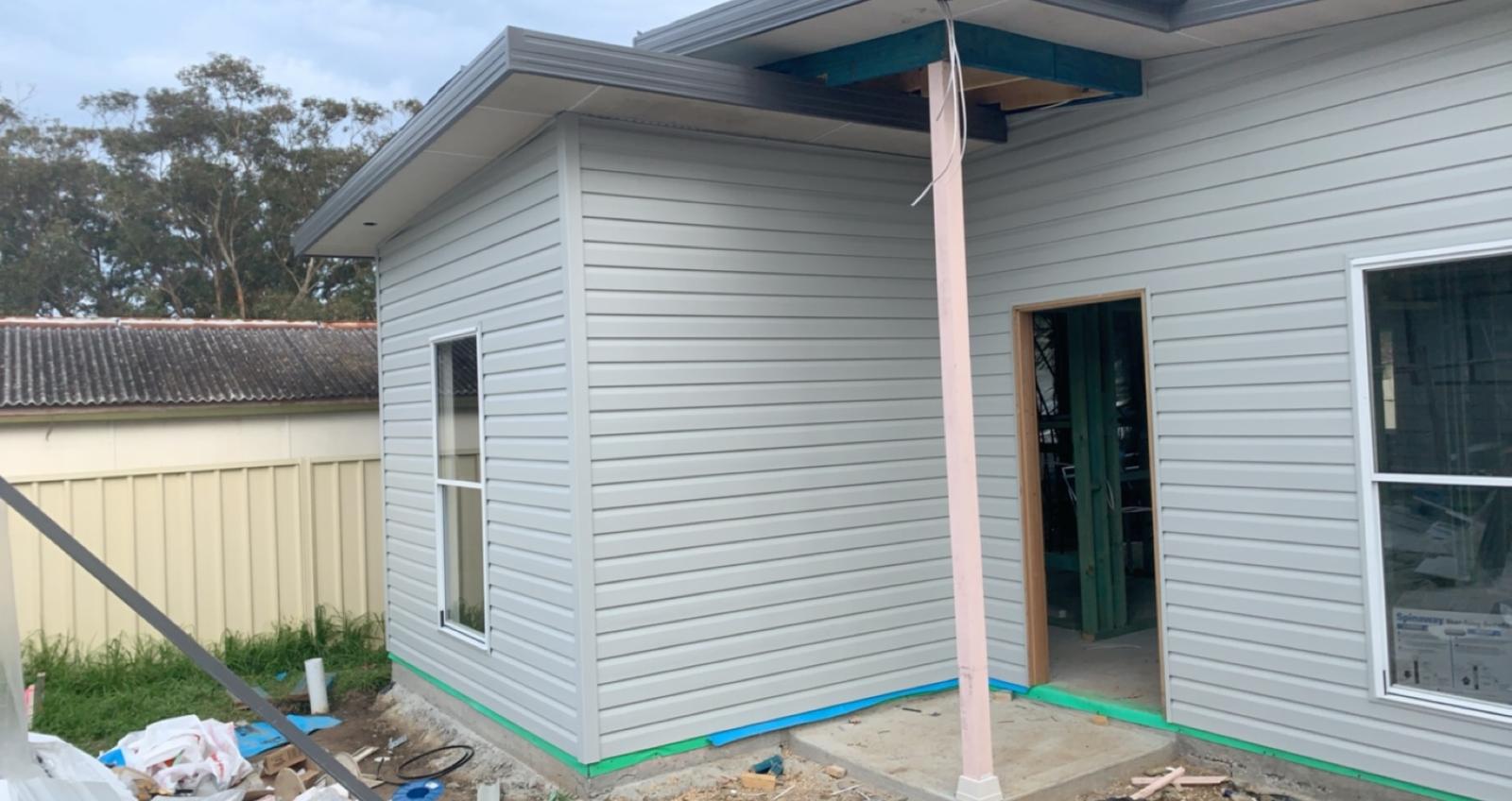 Weatherboard entry, column and awning